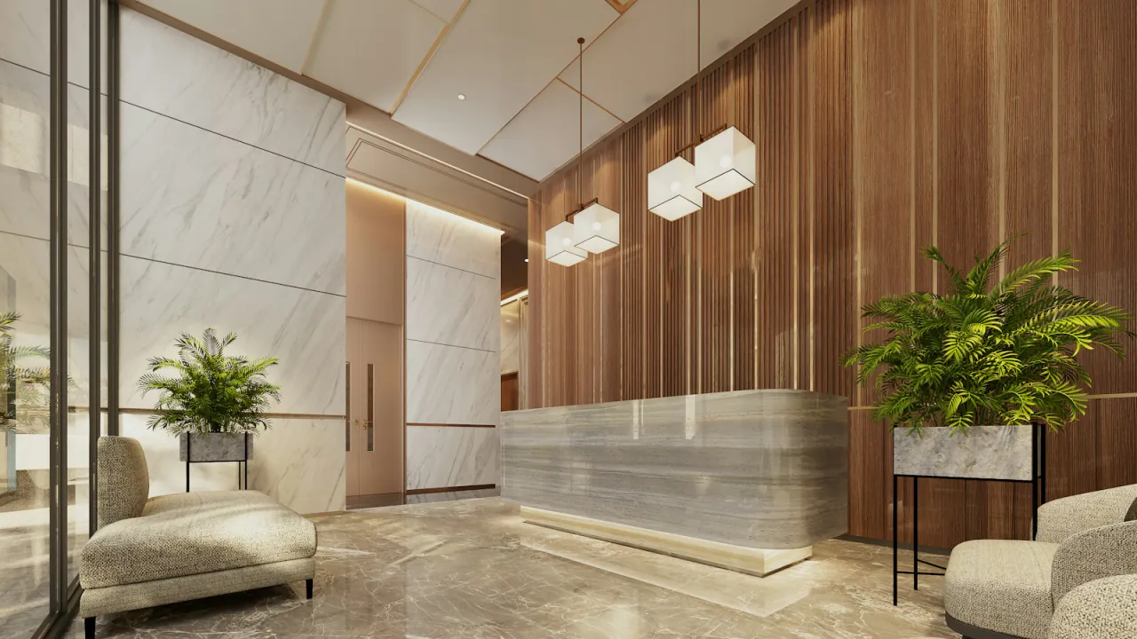 A hotel lobby in marble, wood and planting