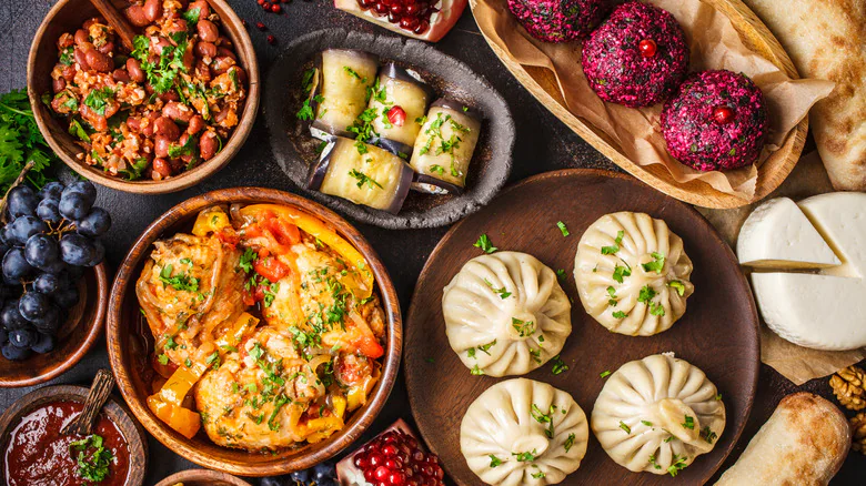 A Georgian table — khinkali, lobio, badrijani, pkhali, cheese and bread
